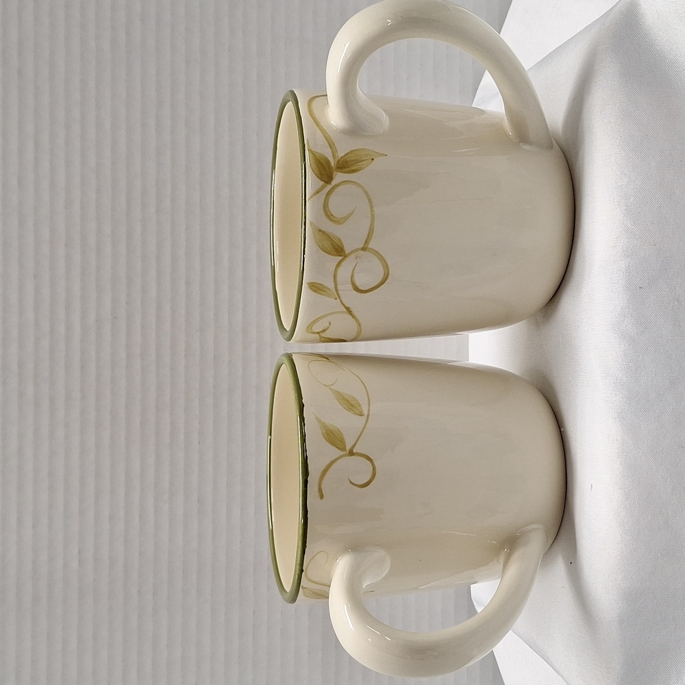 #ABS  pair of Pfaltzgraff traditions mugs cream and green in colour